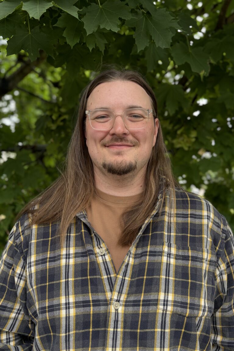 Isaiah Wynter, guy wearing a plaid shirt